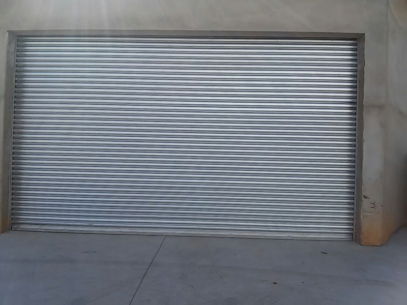 Portas de Aço Manual para área Externa Santa Barbara Do Oeste - Porta de Aço Manual Reforçada